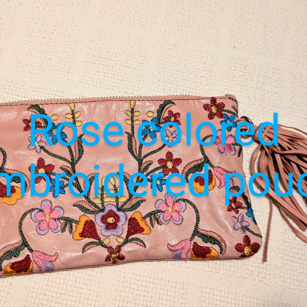 Pink embroidered wallet with tassel